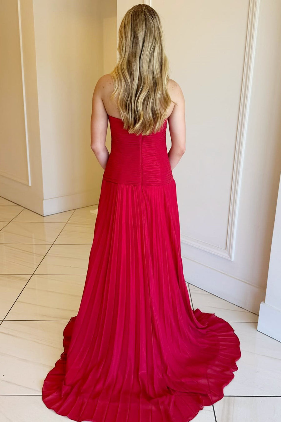 back of Strapless Keyhole Pleated A-Line Prom Dress in red