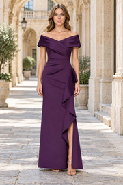 Elegance redefined with this stunning off-shoulder sheath dress designed for your most memorable evening. The luxurious satin fabric drapes beautifully while the strategic ruching creates a flattering silhouette that hugs your curves in all the right places.&nbsp;