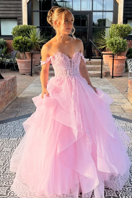 Stunning off-shoulder prom dress designed for an unforgettable night. The sweetheart neckline frames your face beautifully, while delicate lace appliques add sophistication and elegance. The empire waist flatters your figure, flowing into a graceful A-line silhouette that moves with every step