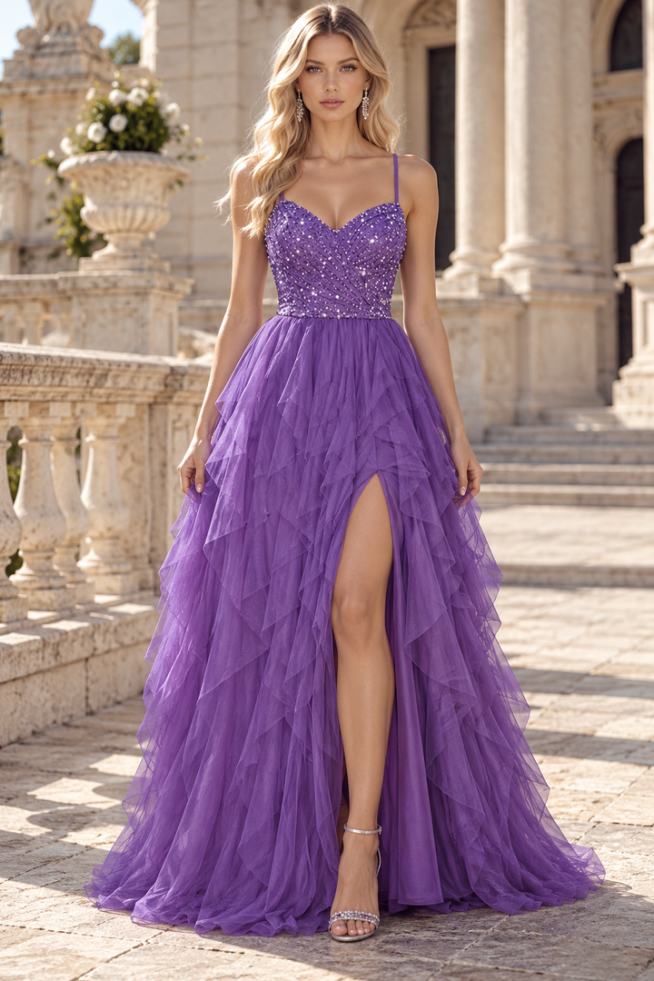 Make a stunning entrance in this elegant purple A-line prom dress. Featuring delicate spaghetti straps and a romantic sweetheart neckline, this gown showcases layered tulle ruffles that add glamorous dimension.&nbsp;