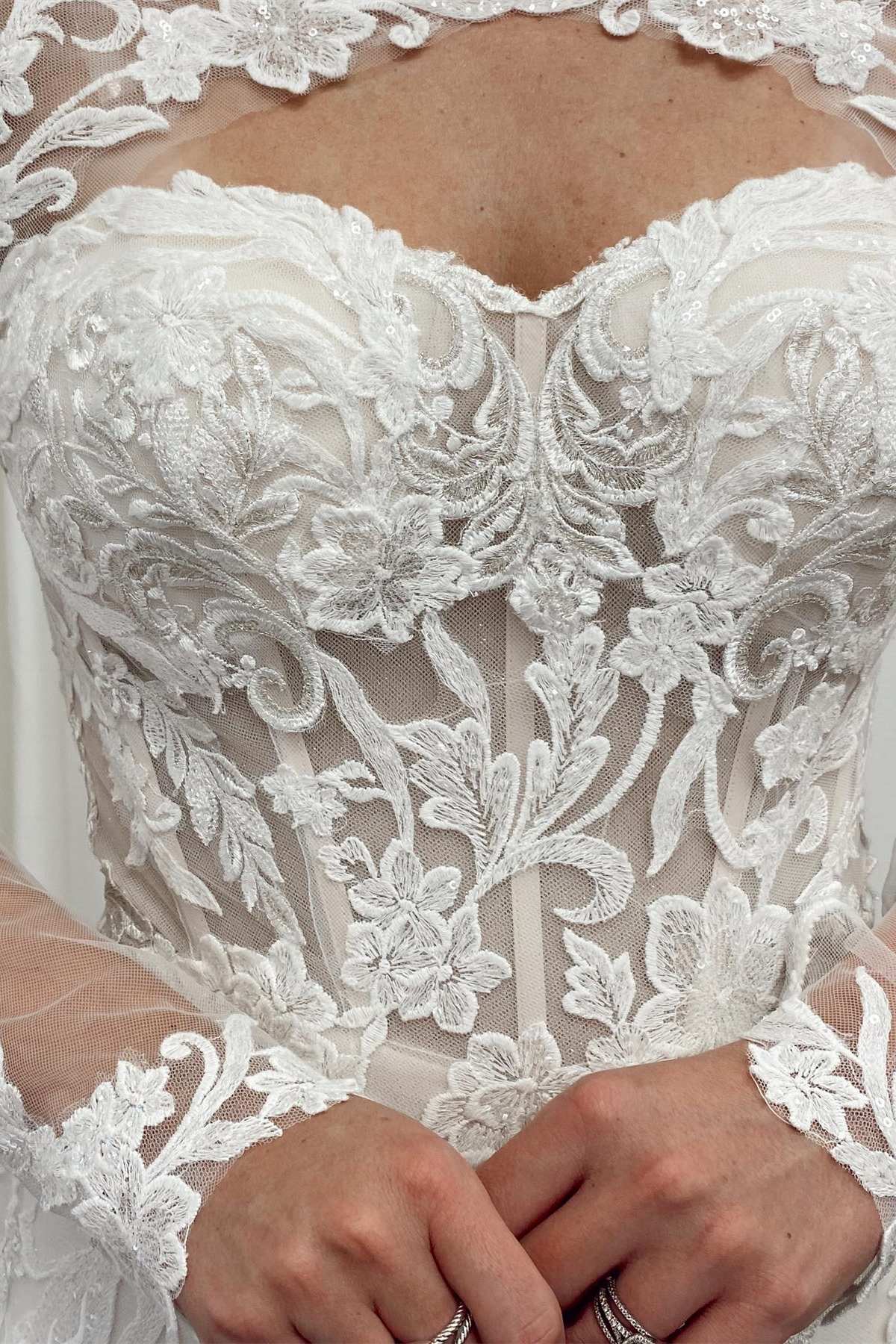 White Lace Cutout Long Sleeves Trumpet Bridal Gown
